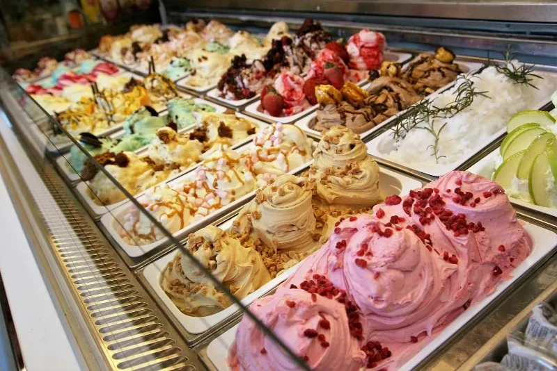 Tubs of ice cream in a shop display